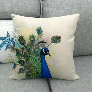 Macro texture of a linen peacock throw pillowcase showing watercolor art and weave details