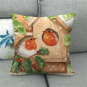 Housse de coussin de Noël avec rouge-gorge à l'aquarelle et nichoir sur lin