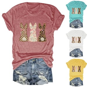 Detail view of cotton t-shirt with three bunny prints in plaid, floral, and leopard patterns