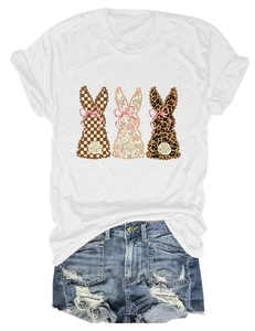 Flat lay of white T-shirt with plaid, floral, leopard rabbits and denim shorts