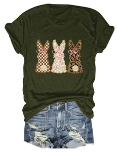 Detail of dark green t-shirt with plaid, floral, and leopard print bunny graphics