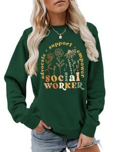 Detail of floral graphic and advocate social worker print on dark green casual sweatshirt