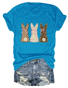 Detail view of women's blue T-shirt featuring three rabbit silhouettes and denim shorts