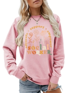 Detail of pink floral sweatshirt with advocate support empower social worker typography
