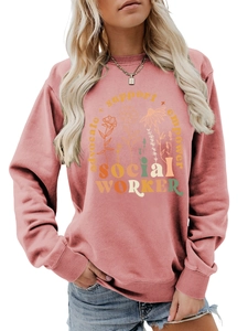 Close-up of advocate support empower graphic print on dusty pink crewneck sweatshirt