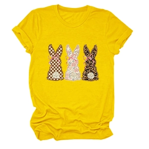 Detail showing bunny patterns with checkered and floral textures on yellow t-shirt