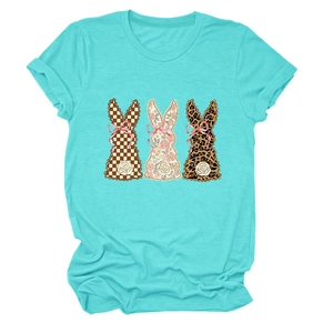 Detail of three bunny patterns with floral and leopard prints on mint green t-shirt