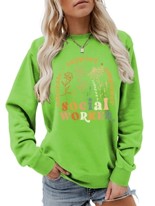 Detail of light green sweatshirt featuring social worker text and floral graphics