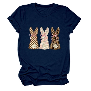 Detail of navy blue t-shirt with three patterned rabbit silhouettes and pink bows