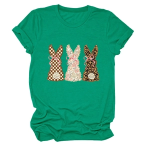 Detail of green cotton T-shirt featuring three rabbits with plaid and floral patterns