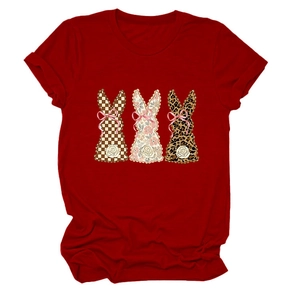 Detail of red cotton T-shirt featuring three rabbits with floral and leopard textures