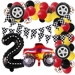 Racing theme 2nd birthday decor with checkered flags and monster truck balloon set