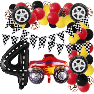 Racing car themed 4th birthday set with checkered flags, balloons and a red truck