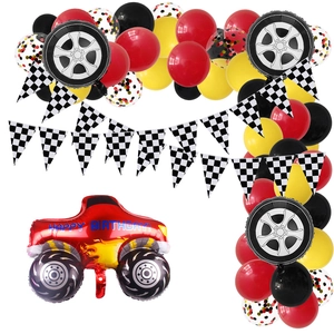 Racing car theme party set with checkered flag, tire balloons and monster truck
