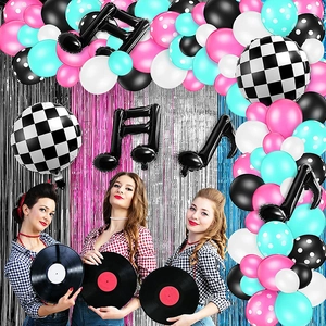 Retro disco balloon arch kit with musical notes and metallic fringe tinsel backdrop