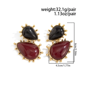 Detailed view of vintage boho floral earrings with gemstone heart pendants and size specs
