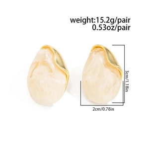 Detailed size and weight specs for teardrop earrings with marble resin and gold trim