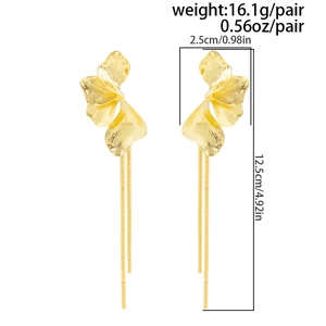 Detailed view of long gold tassel earrings with metallic petals and sizing measurements