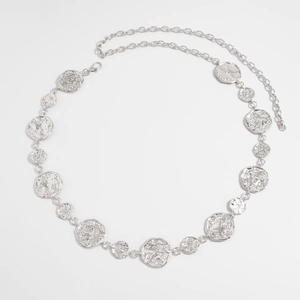 Detail of silver body chain with hammered metal circles and adjustable lobster clasp
