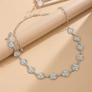 Detail of silver sunflower chain belt with lobster clasp and adjustable extension chain