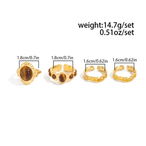 Detailansicht des Retro-Goldring-Sets mit Tigerauge-Steinen und Lava-Textur-Design