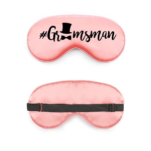 Pink satin groomsman eye mask with adjustable strap and hat bowtie print detail