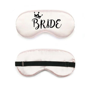 Pink satin Team Bride sleep mask with adjustable strap and crown print for wedding party