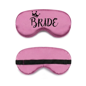 Pink silk satin eye mask with crown and Bride print featuring adjustable black strap