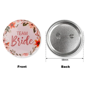 Detailed front and back view of a 58mm Team Bride floral tinplate wedding badge