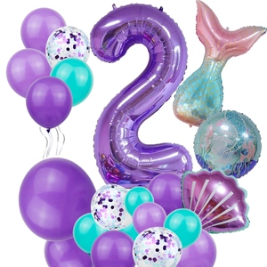 Detail of mermaid 2nd birthday balloon set with purple number two and shell foil balloons