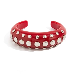Irregular wide red resin open bangle with silver metallic stud details in bold style