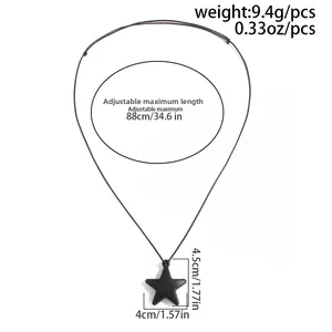 Detail view of matte black star pendant with 88cm adjustable cord and weight specs