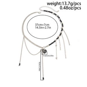 Detail showing dimensions of heart pendant necklace with measurements and weight specifications