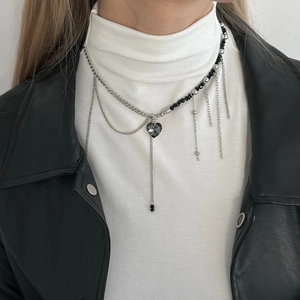 Vintage Y-shaped silver necklace with black beads, heart crystal and metal tassels