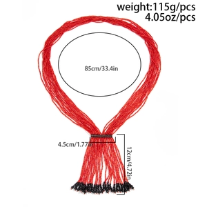 Detailed view of red layered bead tassel necklace with dimensional scale measurements