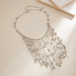 Silver-toned waterfall tassel necklace with metallic bead chains and bohemian fringe style