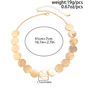 Detail view of 1.7cm brushed gold discs on a 41cm necklace with 7cm extension