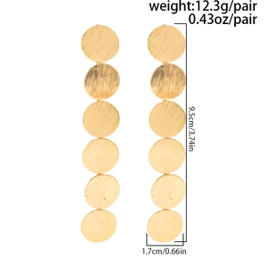 Detailed view of long gold geometric earrings with six brushed metal discs and size specs