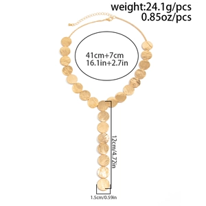 Detailed view of gold Y-shaped necklace with brushed metal disks and sizing specs