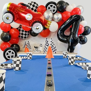 Racing themed 4th birthday party decoration set with car balloons and racing flags
