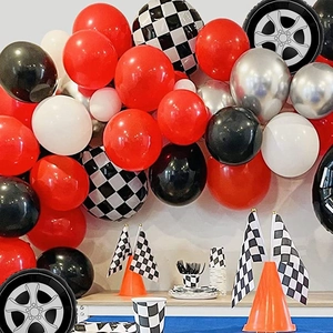 Racing party decorations with checkered flags, tire balloons and balloon arch kit