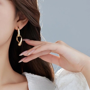 Minimalist 18K gold plated copper earrings with irregular fluid organic drop design
