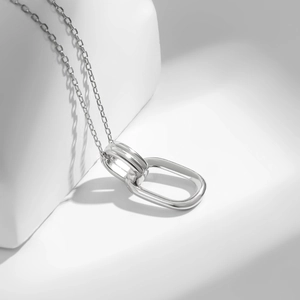 Minimalist 925 sterling silver interlocking double ring necklace with polished finish