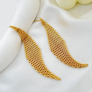 Detailed close-up of 18K gold-plated woven mesh tassel earrings on white silk