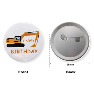 58mm birthday badge with yellow excavator illustration and pin back detail view