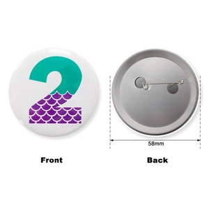 Detailed 58mm mermaid theme birthday badge showing front number 2 and back safety pin