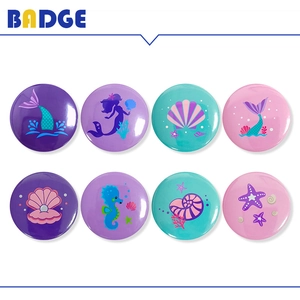 Set of 8 mermaid theme tinplate badges featuring ocean motifs like shells and seahorses
