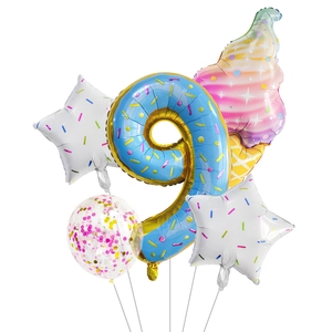 Close-up of donut-themed number 9 balloon with ice cream cone and confetti balloons