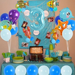 Ocean theme 3rd birthday party set with sea animal balloons and blue tableware