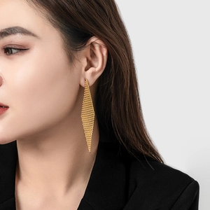 Elegant 18K gold plated brass drop earrings with rhombus woven mesh design on model